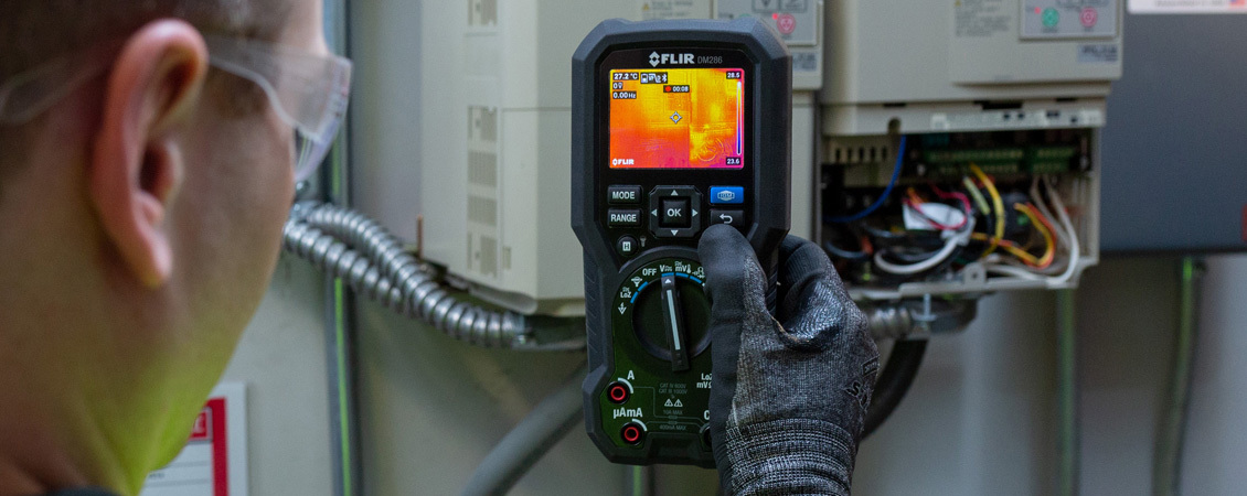 FLIR DM286 industrial multimeter with IGM&trade; thermal imaging, combining advanced electrical testing and infrared diagnostics in a rugged handheld design.