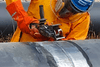 Bristle Blasting technology simultaneously removes corrosion and generates anchor profile. The bristle tips are designed to strike the corroded surface with kinetic energy that is equivalent to standard processes that use grit blast media. Immediately after the bristle tips strike the surface, they retract (“rebound”) from the surface, which results in both corrosion removal and micro-indentation that exposes fresh surface.